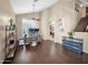 Bright home office with hardwood floors, ceiling fan, and large windows at 4582 S Wildflower Pl, Chandler, AZ 85248