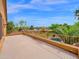 Spacious patio overlooking lush landscaping and a sparkling pool, perfect for outdoor living at 4582 S Wildflower Pl, Chandler, AZ 85248