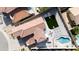 Aerial view of the backyard including pool, patio, BBQ, and turfed cornhole area at 5222 W El Cortez Trl, Phoenix, AZ 85083
