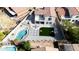 Aerial view of private backyard with pool, outdoor seating, and artificial grass at 5222 W El Cortez Trl, Phoenix, AZ 85083