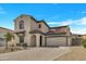 Attractive stucco home with a red tile roof, arched entryway, and spacious driveway at 5222 W El Cortez Trl, Phoenix, AZ 85083