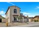 Well-maintained two-story house with stucco siding, tile roof, and front yard desert landscaping at 5222 W El Cortez Trl, Phoenix, AZ 85083