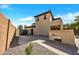 Exterior facade showcasing an attached garage and gravel landscaping at 5222 W El Cortez Trl, Phoenix, AZ 85083