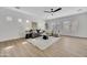 Bright, open living room featuring wood floors and modern furnishings at 5222 W El Cortez Trl, Phoenix, AZ 85083