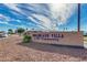 Welcome to Dreamland Villa, a 55+ community, with a beautifully landscaped entrance sign at 5445 E Dallas St, Mesa, AZ 85205