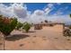 Well-maintained home with an expansive gravel backyard and mature landscaping; offers a peaceful outdoor setting at 5445 E Dallas St, Mesa, AZ 85205