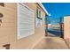 View of pool rules posted on building next to pool at this community at 5445 E Dallas St, Mesa, AZ 85205