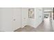 Bright hallway with tile flooring, leading to the living areas, flooded with natural light at 582 W Freedom St, Florence, AZ 85132