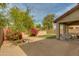 Desert landscaped backyard, featuring covered patio area perfect for outdoor dining and lounging at 6626 W Laurel Ave, Glendale, AZ 85304