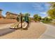 Community playground with slides and play area surrounded by lush landscaping offering recreational opportunities for children at 6626 W Laurel Ave, Glendale, AZ 85304