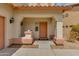 Inviting front porch with charming details and covered entry at 6626 W Laurel Ave, Glendale, AZ 85304