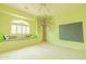 Bright bedroom with a large window seat, tree mural, and chalkboard wall at 6778 W Lariat Ln, Peoria, AZ 85383