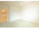 Bright bedroom with neutral carpet, a ceiling fan, and a closet at 6778 W Lariat Ln, Peoria, AZ 85383