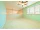 View of a bonus room featuring carpeted floors and a large window with natural light at 6778 W Lariat Ln, Peoria, AZ 85383