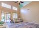 Bright living room showcasing high ceilings, natural light, and an open floor plan at 6778 W Lariat Ln, Peoria, AZ 85383