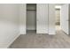 Bedroom featuring multiple closets and neutral carpet at 7215 N 123Rd Dr, Glendale, AZ 85307