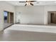 Bright living room with tile floors and sliding glass doors to the patio at 7215 N 123Rd Dr, Glendale, AZ 85307