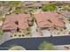 Aerial shot showcasing the neighborhood homes with red tile roofs and desert landscaping at 7216 E Aurora --, Scottsdale, AZ 85266