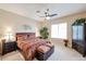 Cozy bedroom featuring a comfortable bed, ceiling fan, and ample natural light at 7216 E Aurora --, Scottsdale, AZ 85266
