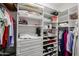 Organized walk-in closet with shelves, drawers, and ample storage space at 7216 E Aurora --, Scottsdale, AZ 85266