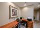 Functional home office with built-in desk, plenty of outlets, and natural lighting at 7216 E Aurora --, Scottsdale, AZ 85266