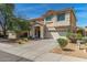 Charming two story home with lush landscape, and a two car garage at 7622 S 69Th Dr, Laveen, AZ 85339