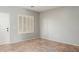 Bright room with tiled floors and a door with plantation shutters at 7622 S 69Th Dr, Laveen, AZ 85339