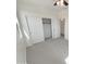 Bright bedroom featuring sliding door closet and a ceiling fan at 7924 S 70Th Ln, Laveen, AZ 85339