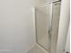 Bathroom featuring a modern, glass-enclosed shower at 7924 S 70Th Ln, Laveen, AZ 85339