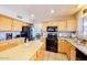 Bright kitchen with modern appliances and ample counter space at 7971 W Montebello Ave, Glendale, AZ 85303