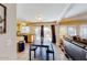 Open kitchen and dining area with access to the outdoor pool and patio at 7971 W Montebello Ave, Glendale, AZ 85303