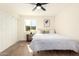 Cozy bedroom featuring modern design, neutral tones, and ample space with a large closet at 1012 E Estevan Ave, Apache Junction, AZ 85119