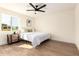 Inviting bedroom featuring modern finishes and a comfortable queen sized bed at 1012 E Estevan Ave, Apache Junction, AZ 85119