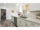 Kitchen featuring stainless steel appliances, new countertops, and modern decor and window view at 10927 W Peoria Ave, Sun City, AZ 85351