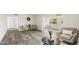 Open living space featuring hardwood floors and a neutral palette at 10927 W Peoria Ave, Sun City, AZ 85351