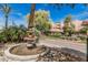 Ornamental fountain and manicured landscaping at 1211 N Miller Rd # 213, Scottsdale, AZ 85257