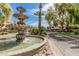 Ornamental fountain and manicured landscaping at 1211 N Miller Rd # 213, Scottsdale, AZ 85257