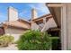 Inviting exterior with lush landscaping and private entry to the home at 1211 N Miller Rd # 213, Scottsdale, AZ 85257