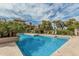 Lush landscaping surrounds this inviting community pool at 1211 N Miller Rd # 213, Scottsdale, AZ 85257