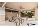 Outdoor pool area featuring picnic tables and seating, ideal for community gatherings and relaxation at 1211 N Miller Rd # 213, Scottsdale, AZ 85257