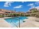 Inviting community pool with shallow area and lounging area, perfect for summer days at 1211 N Miller Rd # 213, Scottsdale, AZ 85257