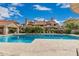 Beautiful community pool with water features and lounging area at 1211 N Miller Rd # 213, Scottsdale, AZ 85257