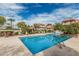 Inviting community pool with lounge chairs and lush landscaping, perfect for relaxation at 1211 N Miller Rd # 213, Scottsdale, AZ 85257