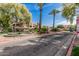 Exterior view with ornamental fountain and manicured landscaping at 1211 N Miller Rd # 213, Scottsdale, AZ 85257
