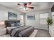 Serene bedroom with a comfortable bed, soft lighting, and modern decor at 12427 W El Nido Ln, Litchfield Park, AZ 85340