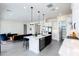 Bright open kitchen featuring a large island, stainless appliances, and modern finishes at 14407 N 75Th Dr, Peoria, AZ 85381
