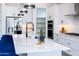 Modern kitchen showcasing a large island, stainless appliances, and ample cabinet space at 14407 N 75Th Dr, Peoria, AZ 85381