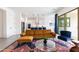 Open-concept living room featuring modern furnishings and bright, natural light at 14407 N 75Th Dr, Peoria, AZ 85381