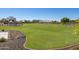 Beautiful community park with lush green grass, landscaping, and recreational amenities at 14407 N 75Th Dr, Peoria, AZ 85381