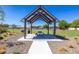Covered picnic area featuring picnic tables and barbecue grills for outdoor gatherings at 14407 N 75Th Dr, Peoria, AZ 85381